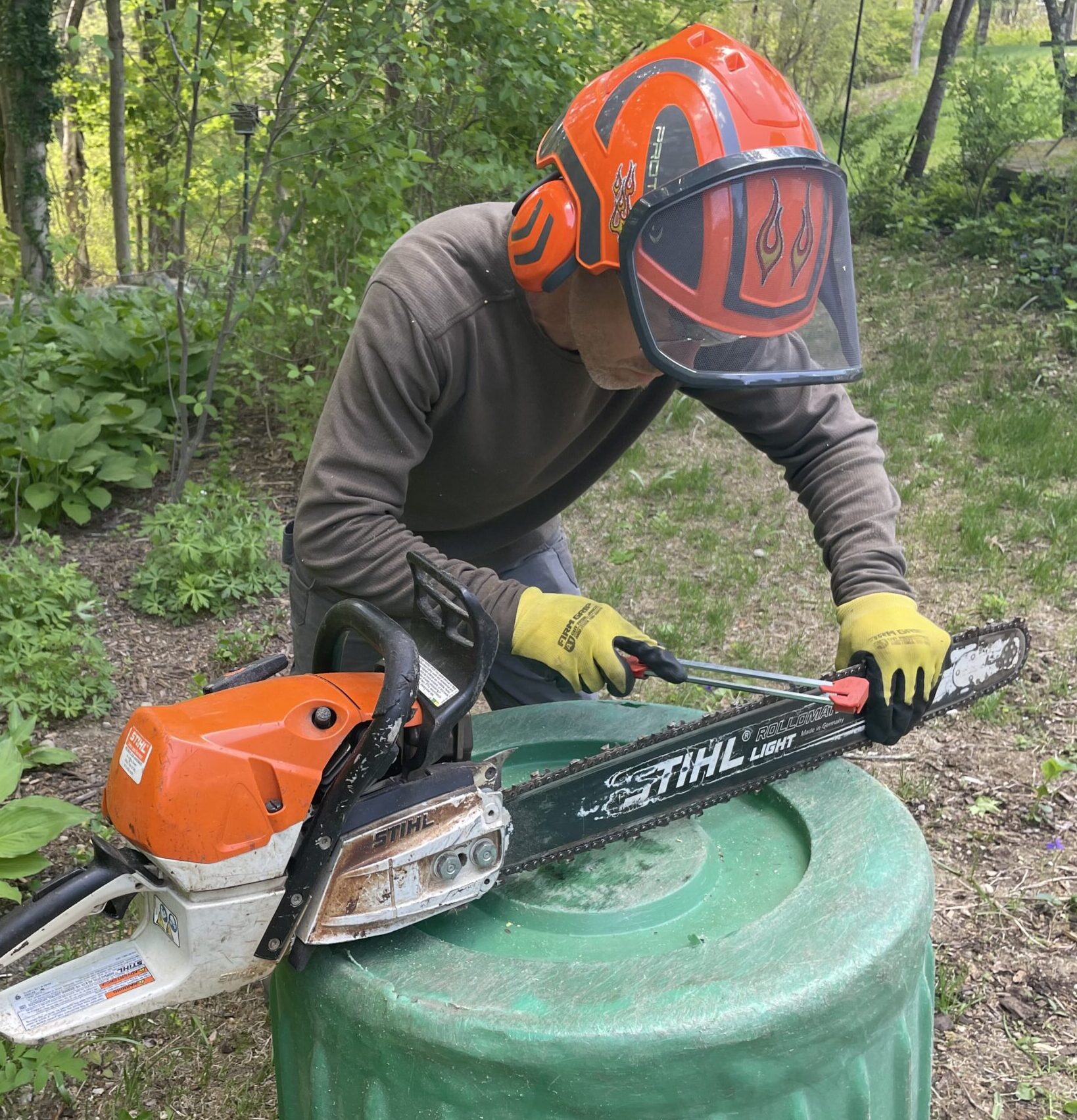 cutler-evans-tree-employee-with-a-chainsaw